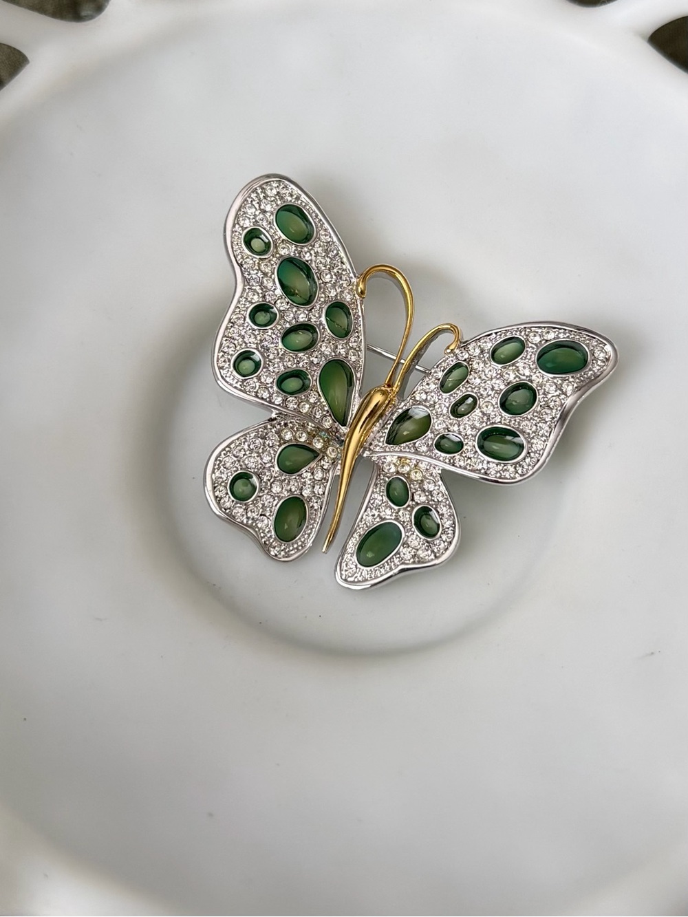 Nolan Miller Silver and Gold Butterfly Brooch with Green and Clear Accents